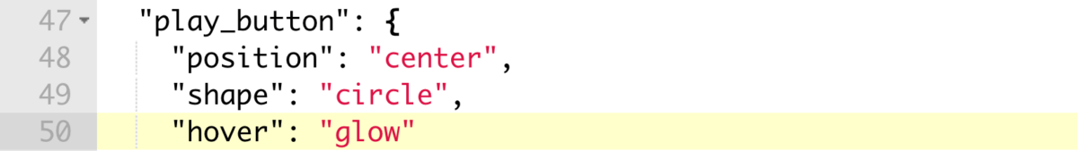 JSON code block showing how to make the play button glow on hover with a video.js player.