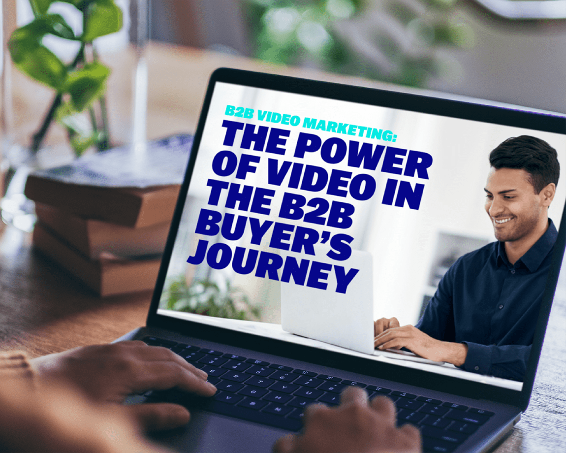 person reading brightcove b2b buyers-report on laptop